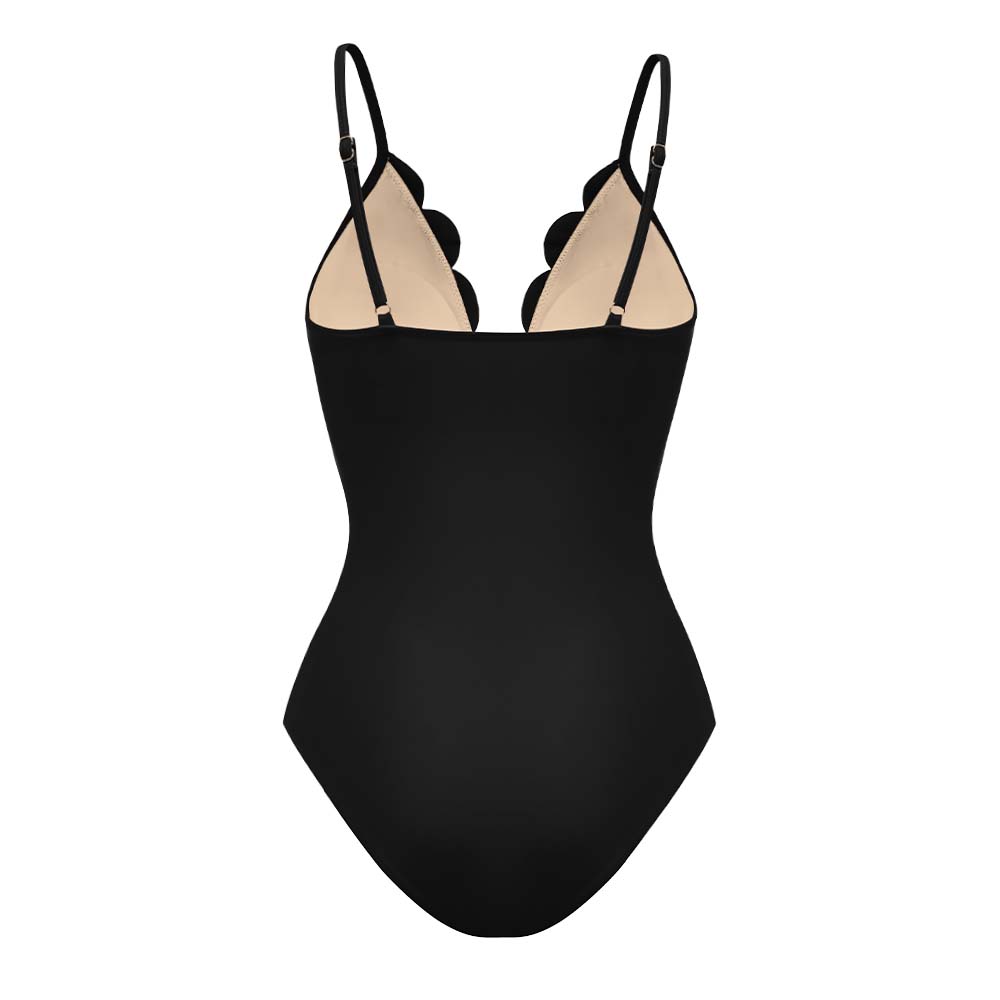 Maillot de bain une pièce noir à fleurs découpées au laser et détails ajourés, avec jupe assortie