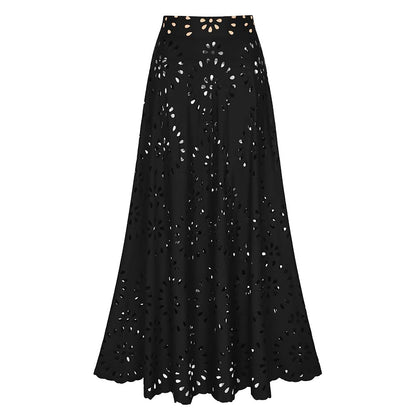 Maillot de bain une pièce noir à fleurs découpées au laser et détails ajourés, avec jupe assortie