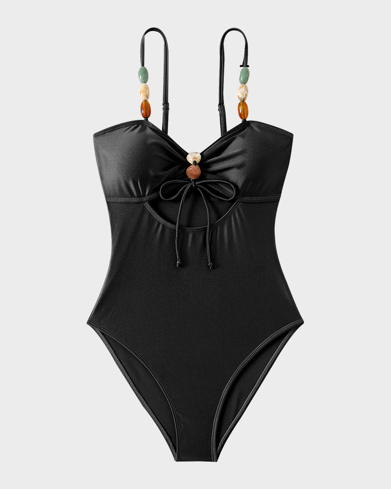 Maillot de bain élégant en satin avec perles décoratives et découpes tendance