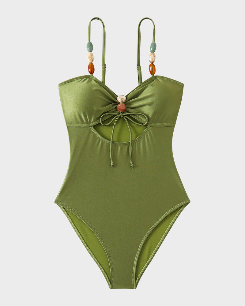 Maillot de bain élégant en satin avec perles décoratives et découpes tendance