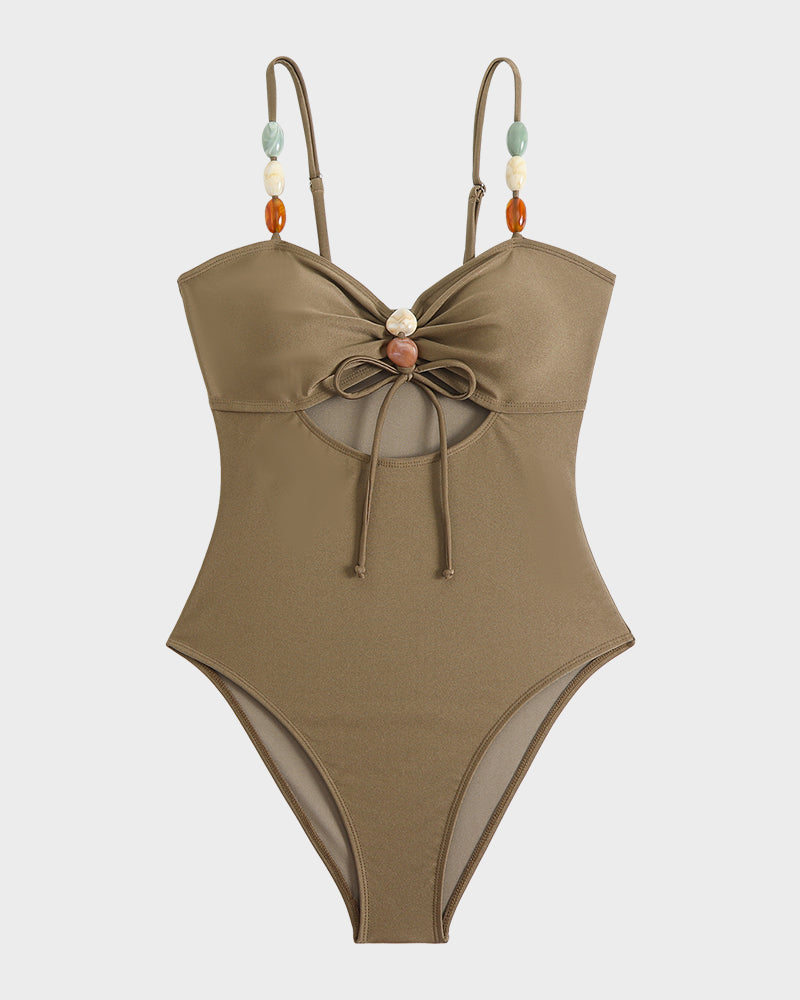 Maillot de bain élégant en satin avec perles décoratives et découpes tendance