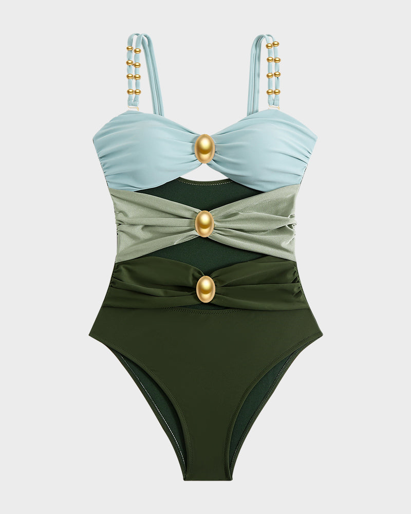 Maillot de bain une pièce froncé avec découpes et détails en perles dorées
